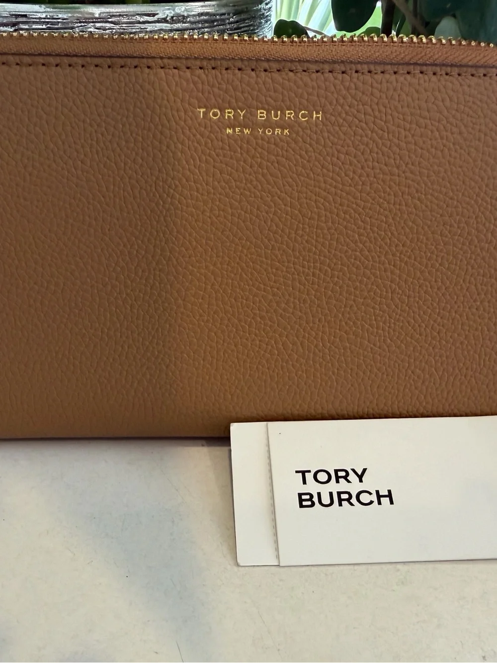 Tory Burch sleek zip